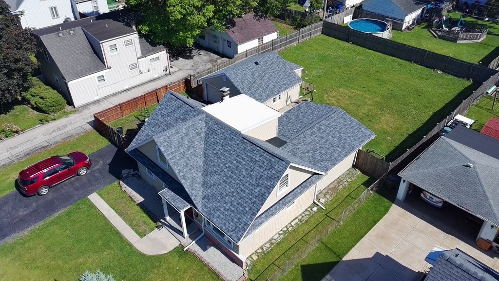 Completed Eagle Star roof on a tan Chicagoland home