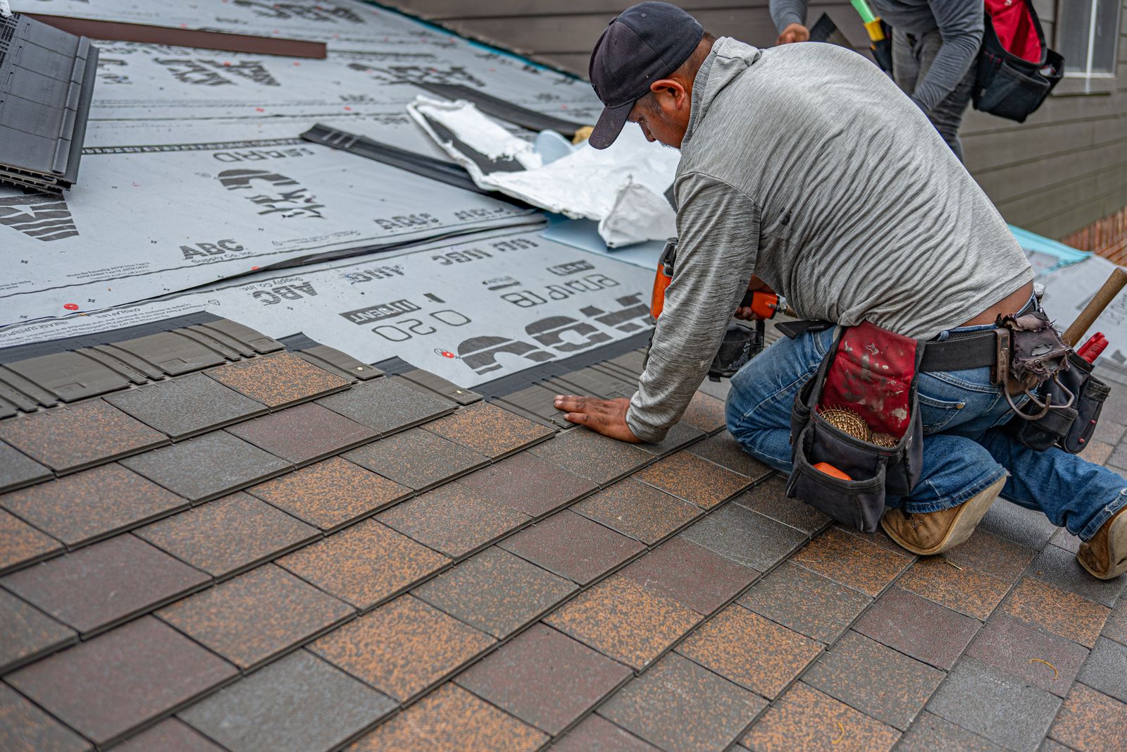 Representative Pexels stock photo of a roofing crew installing shingles; not an Eagle Star project